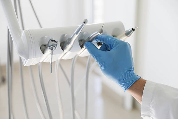 Professional Tooth Extraction technician working in Gainesville, GA